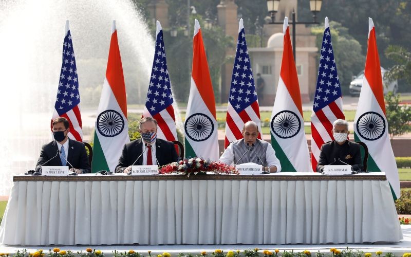 India's Defence Minister Rajnath Singh speaks next to U.S. Secretary of State Mike Pompeo, U.S. Secretary of Defence Mark Esper and India's Foreign Minister Subrahmanyam Jaishankar during a joint news conference after their meeting at Hyderabad House in New Delhi, India, October 27, 2020. REUTERS/Adnan Abidi